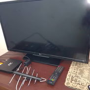 Venta de televisor con su cajita y antena,me ajusto. - Img 56923203