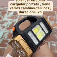 Linterna con panel solar y puerto de carga usb para teléfonos 6-7h carga - Img 54904940