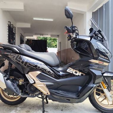 CAMBIO Y DOY 7 MIL USD Y TRICICLO DE COMBUSTION Y DOS MOTOS UNA RACING LINDISIMA Y UNA SCOOTER SUPRA ITALICA 300 CC - 5/6