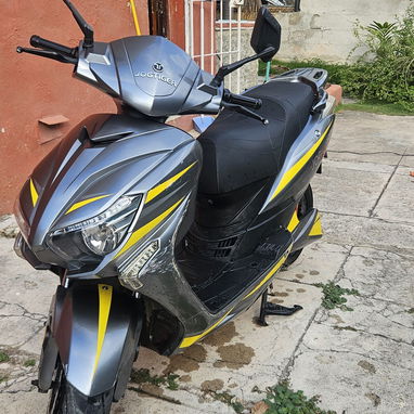 Moto electrica de uso. Bateria nueva - Img 122344131