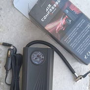 Inflador de neumáticos portátil, funciona conectado al automóvil. - Img 57238054
