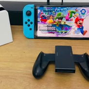 VENDO NINTENDO SWITCH OLED PIRATEADO CON TODOS SUS ACCESORIOS NO TE QUEDES SIN JUGAR POR QUÉ NO TIENES LUZ - Img 56174149
