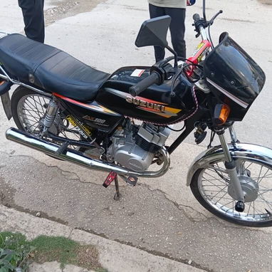 Suzuki AX-100 - 3/3