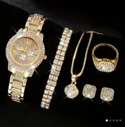 Reloj dorado con sus accesorios - Img 49903763