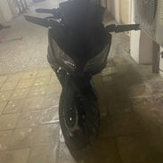 Vendo moto eléctrica racing batería michosuki haciendo 80 km por carga papeles en regla en 2500 usd interesados llamar - Img 55761102