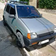 Daewoo Tico en  color gris, preparado con todo: rines deportivos, parrilla de carga en el techo y un equipo de música - Img 58078726