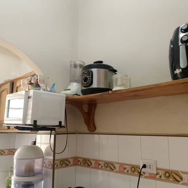 Venta de acogedor apartamento en bajos de un biplanta, 1 habitación  Reparto Modelo, Regla. - 6/10