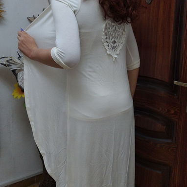 Vendo sobretodos, es  de tela de pulóver, nuevos. Hay en blanco y en negro - Img 102811732