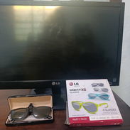 Monitor LG de 22", tecnología 3D. Se aladen 5 espejuelos 3D de marca LG tambien - Img 57318283