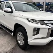 Mitsubishi L200 del 2022 diesel manual ,pintura de fábrica,una camioneta pickup de renombre mundial - Img 50502347