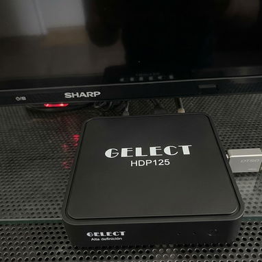 TV de 32" con su cajita decodificadora - 2/2