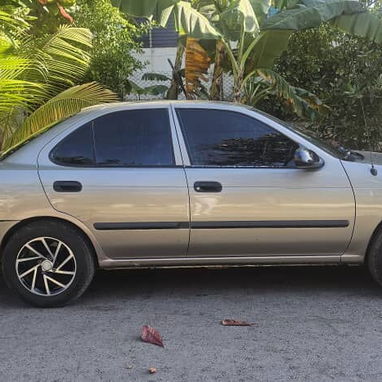 Se vende Nissan Sentra gris del 2005 - Img 124493055