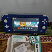 VENDO NINTENDO SWITCH LITE PIRATEADO SD 128GB EQUIPO EN PERFECTO ESTADO PRECIO... 150 USD.... - Img 56998036