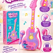 Guitarra con 2 musicas y micrófono llega pilas (no incluidas) 28USD - Img 58217989