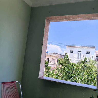 Apartamento en buen estado constructivo en el segundo piso de un edificio capitalista de 4 pisos en el Vedado - 9/10