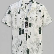 Camisa Estilo Resort con Tejido Calado – Frescura y Estilo Casual  Renueva tu armario con nuestra camisa estilo resort d - Img 58477143