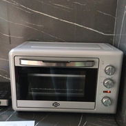 Horno eléctrico de 32 litros sólo 2 veces se usó - Img 55782260