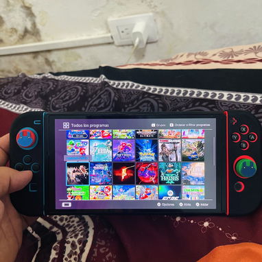 Nintendo Switch oled con todos sus accesorios - 3/4