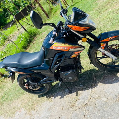 Moto Puma Kawasaki - Img 126034733