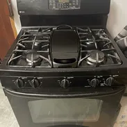 Vendo cocina de gas americana con parrilla asador y horno con auto limpieza - Img 56983028