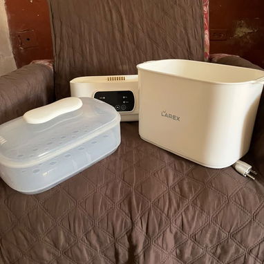 Esterilizador de biberones seca , esteriliza y descongela 3 en 1.   30 USD - 3/4