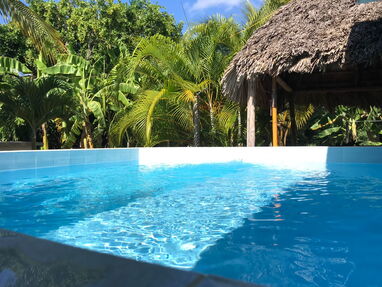 ⭐ Renta casa de 2 habitaciones climatizadas, cocina equipada, terraza,ranchón, barbecue, piscina, parqueo en Guanabo - Img main-image