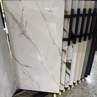 Porcelanato 1.20x60 la caja viene por 2.88 y trae 4 losas se vende por metro cuadrado - 6/10