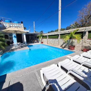 Renta casa en la playa de Guanabo con piscina con recirculación,  ubicada a 1/2 cuadra del mar +53 52463651 , 4 hab ,J - Img 114303301