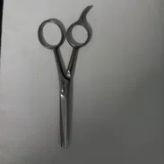 Tijera de peluqueria marca filarmonica - Img 58127671