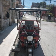 Mensajero en triciclo - Img 56462649