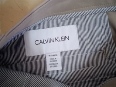 Pantalón de vestir Calvin Klein de hombre y tenis nuevos #44 - Img 66578931