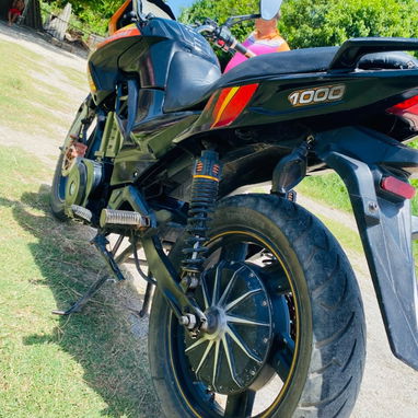 Moto Puma Kawasaki - Img 126034730