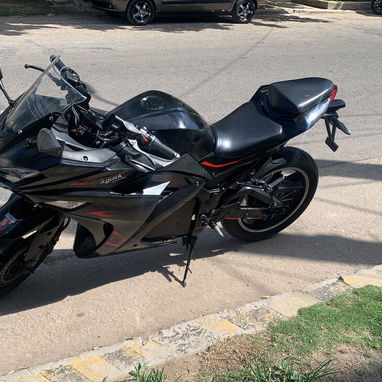 Vendo moto eléctrica racing batería toqman de 35 amphaciendo 80 km por carga papeles en regla en  2500 usd interesados - 3/4