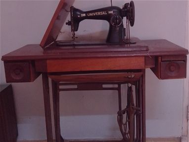 Máquina de coser antigua - Img main-image