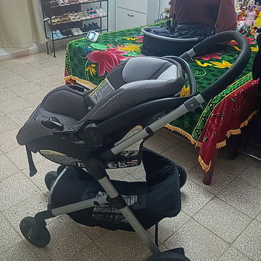 Coche para bebé con asiento para carro marca Evenflo - Img 121965008