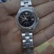 reloj orient plateado original de mujer, es de pila 8000 cup - Img 49244188