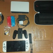 Vendo Nintendo Switch OLED Pirateada 380 usd. Único dueño, 2 meses de uso, impecable , 256 gb SD - Img 55405296