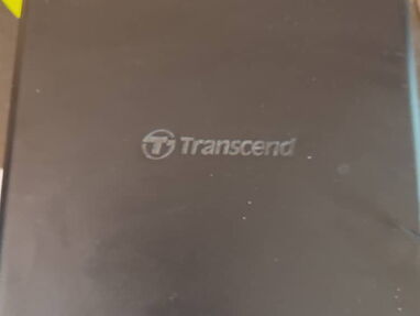 VENDO CAJA EXTERNA MARCA TRANSCEND 3.O CON SU TRANSFORMADOR  Y UN HDD DE 2TB AL 100° en 50 USD - Img main-image