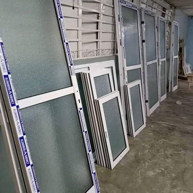 Puertas de marquetería de aluminio. Ventanas de corredera.paños fijos.bajosde meseta - 10/10